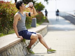 pre workout for runners - man drinking